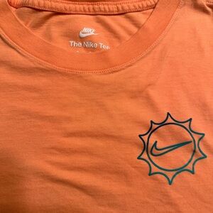 Nike Orange Tees with Blue Graphic